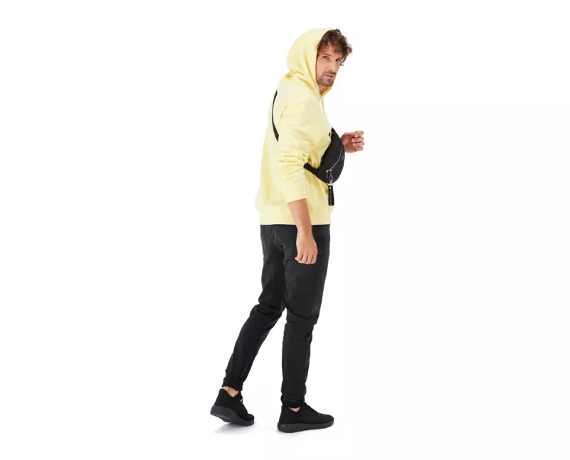 Man in a yellow hoodie in live model fashion photography