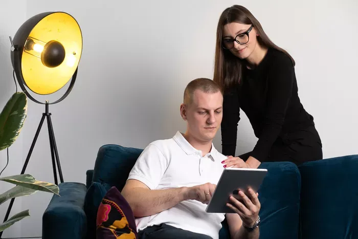 Colleagues Reviewing Digital Content on a Tablet