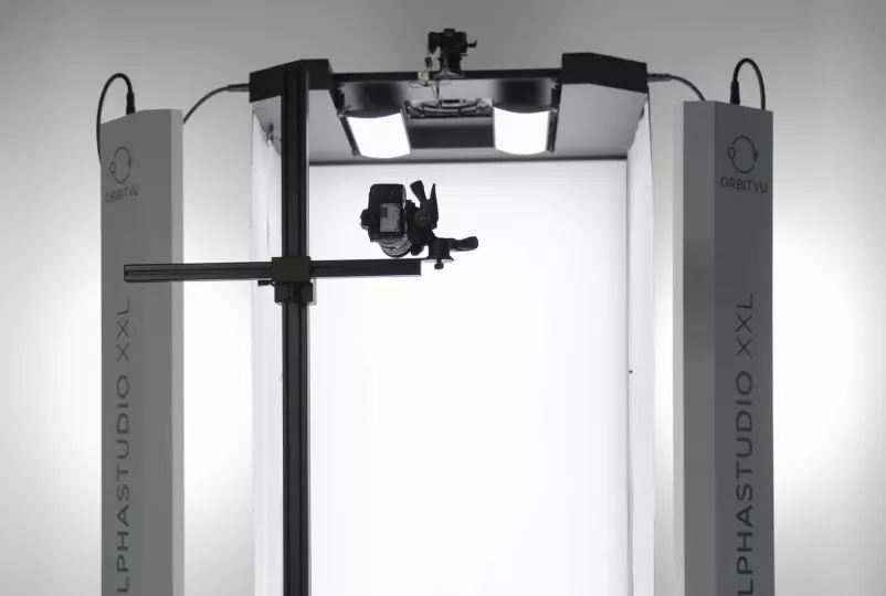 Professional Camera and Top Lighting Setup in Photo Studio