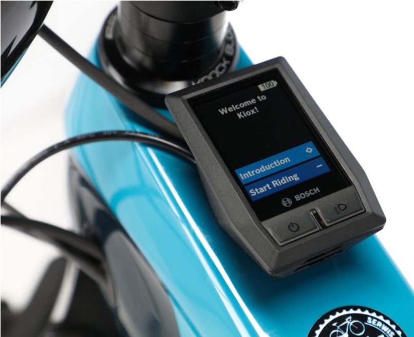  E-Bike Display on Blue Bicycle Frame