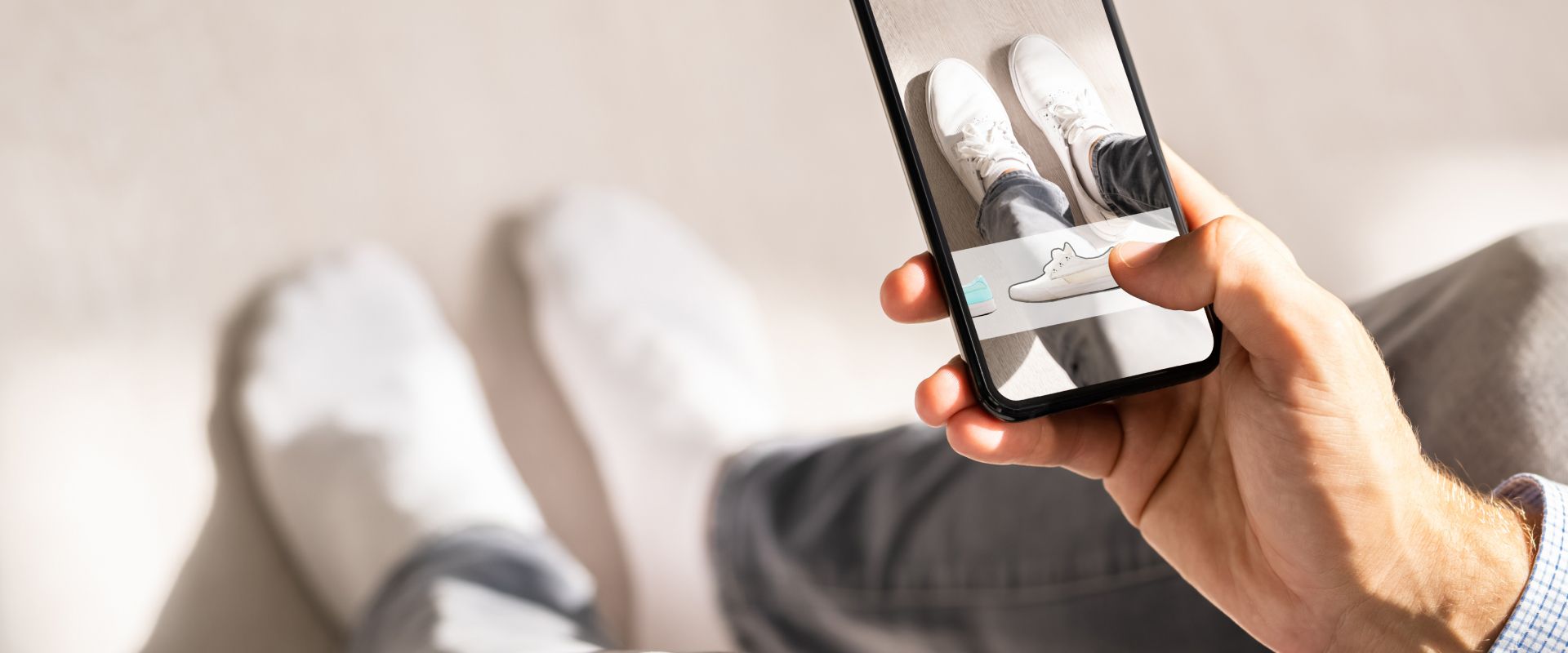 A person virtually trying out different shoes thanks to AR technology A person virtually trying out different shoes thanks to AR technology