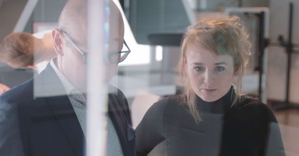 Business Colleagues Collaborating and Reviewing Work