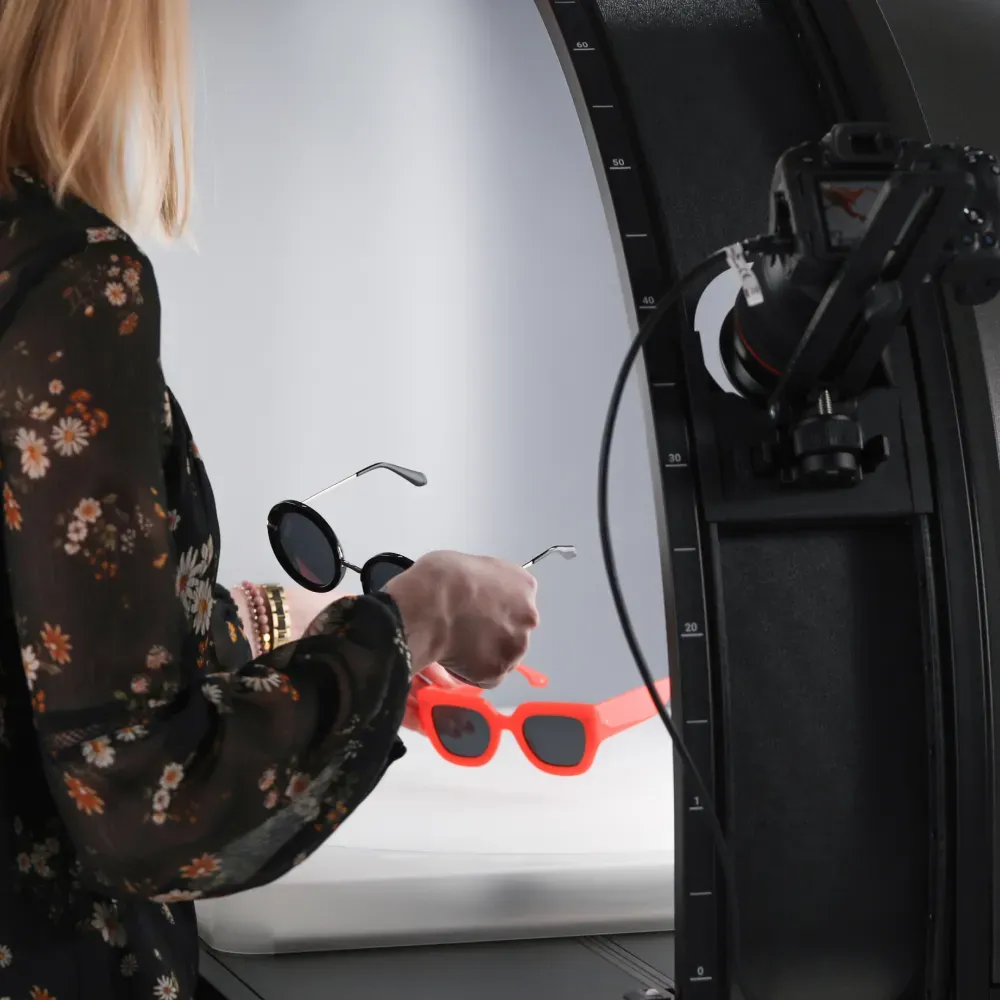 Arranging Two Pairs of Sunglasses in Studio