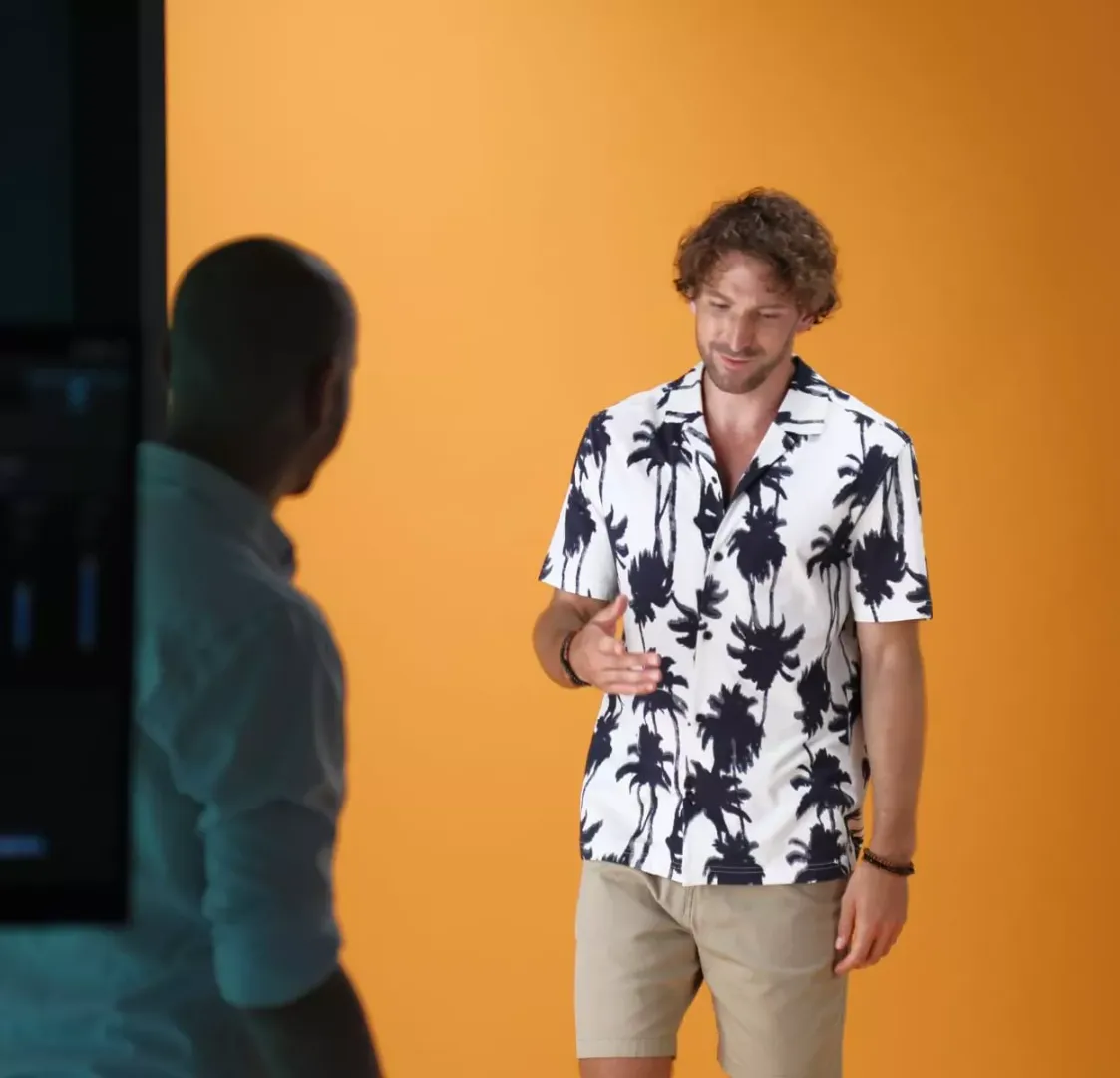 Model and Photographer Discussing Poses in Studio