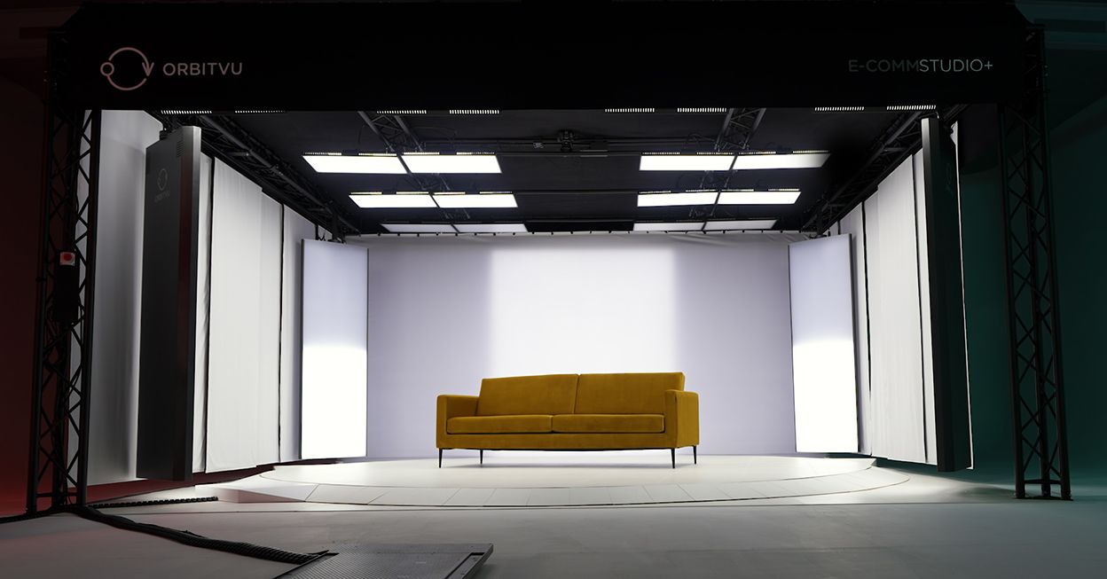 Yellow Sofa on Rotating Platform in Photography Studio