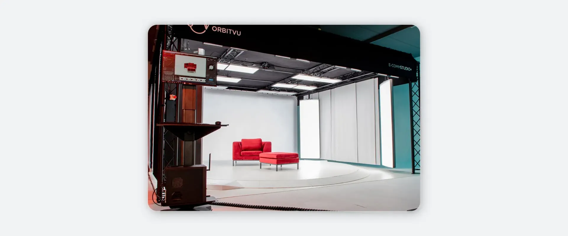 Professional E-commerce Photography Studio with Red Couch and Automated Lighting