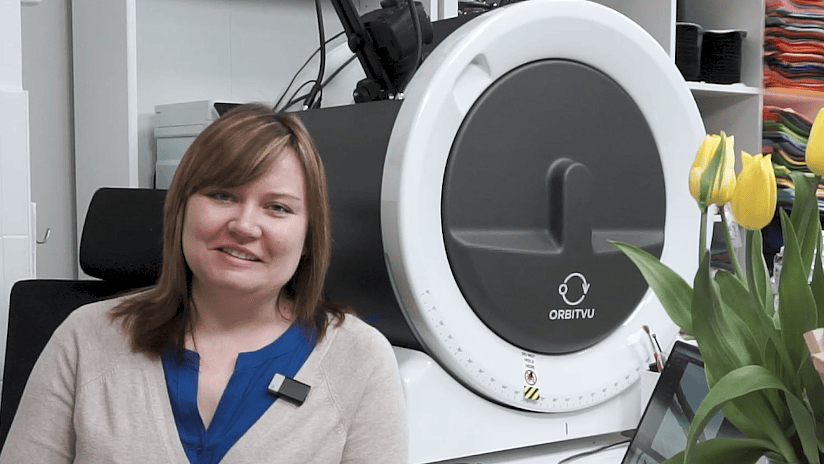 Woman next to Orbitvu E-commerce Studio