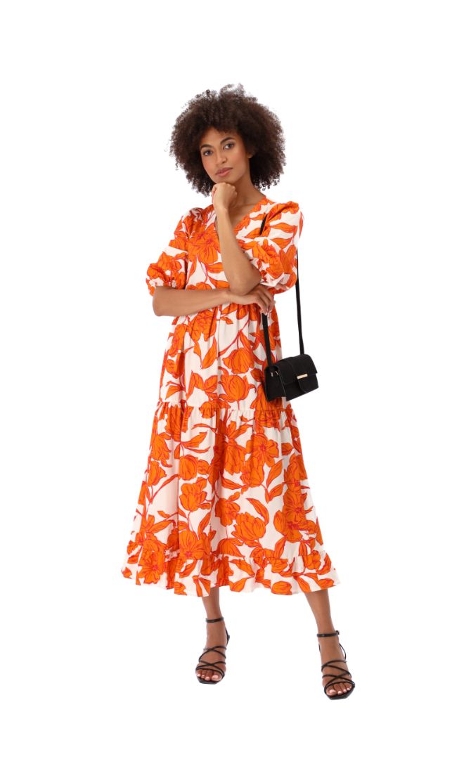Woman in Orange Floral Maxi Dress and Black Crossbody Bag