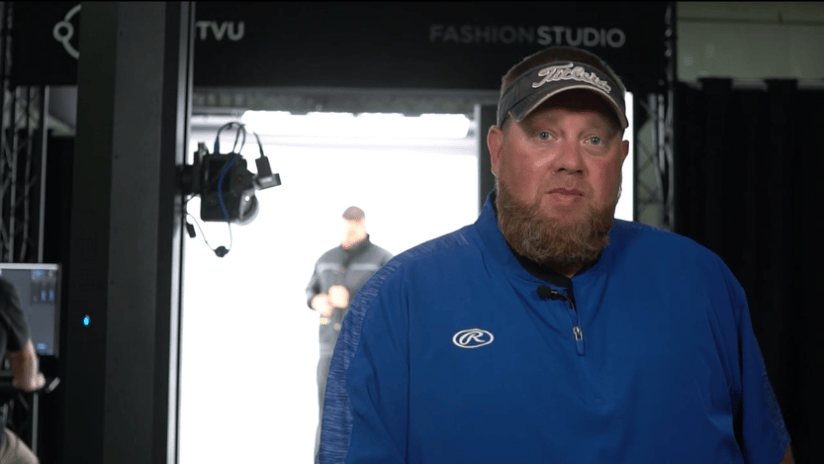 Man in Blue Shirt at Fashion Studio Photography Setup