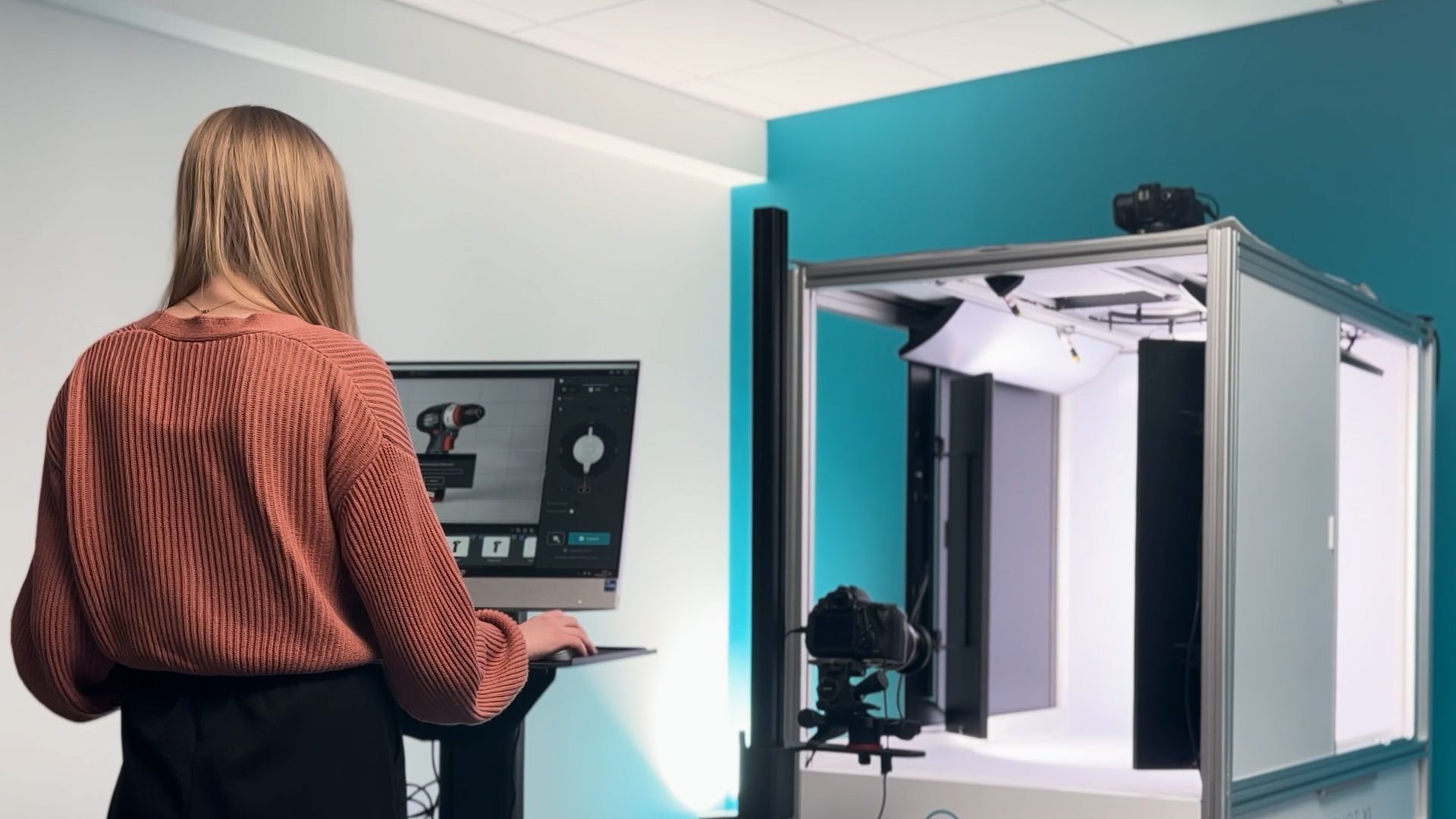 Woman Controlling 360-Degree Product Photography Equipment