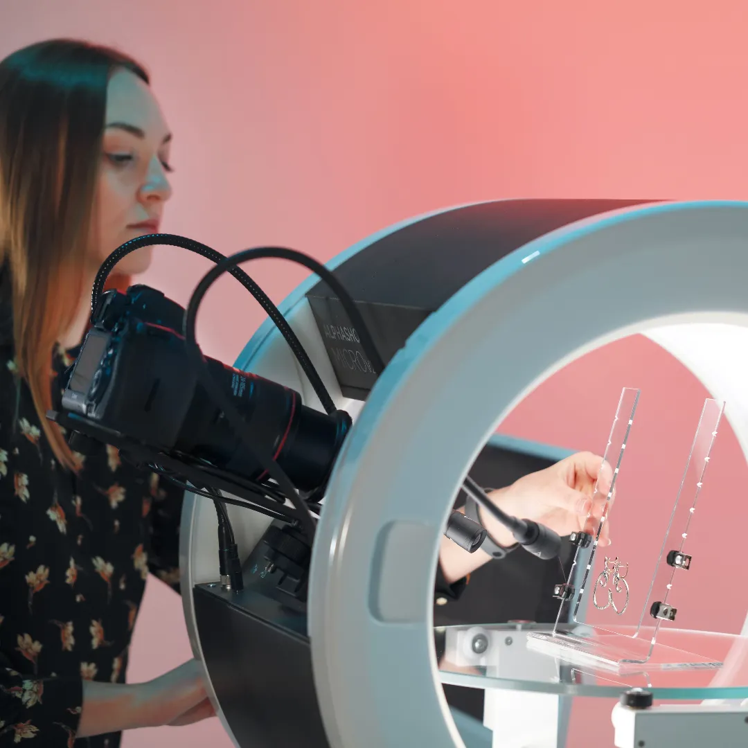 Woman Placing Earrings on Display in ORBITVU Jewellery Studio