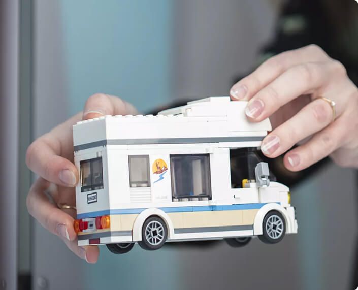 LEGO Camper Van Model Held for Display