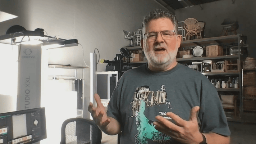 Man Talking in Front of Orbitvu Studio XXL Photography System