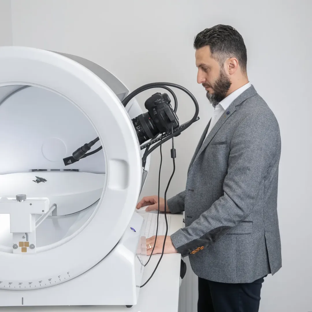 Man Operating Automated ORBITVU Product Photography Studio