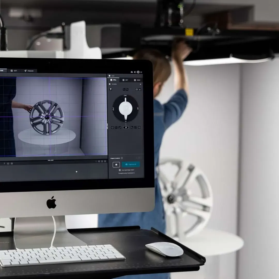 Operator Setting Up Car Wheel in Orbitvu Studio