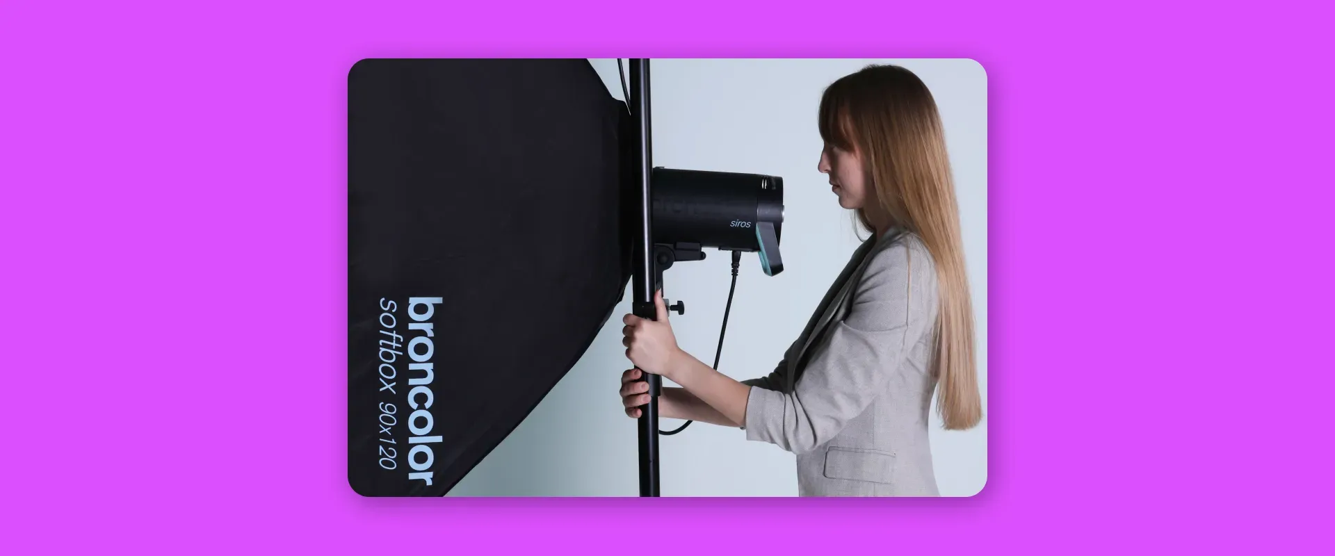 Photographer Adjusting Broncolor Siros Studio Strobe with Softbox