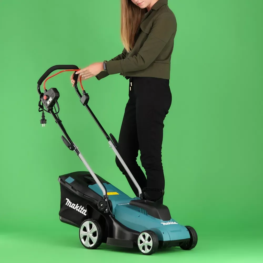 Woman demonstrating Makita on green screen
