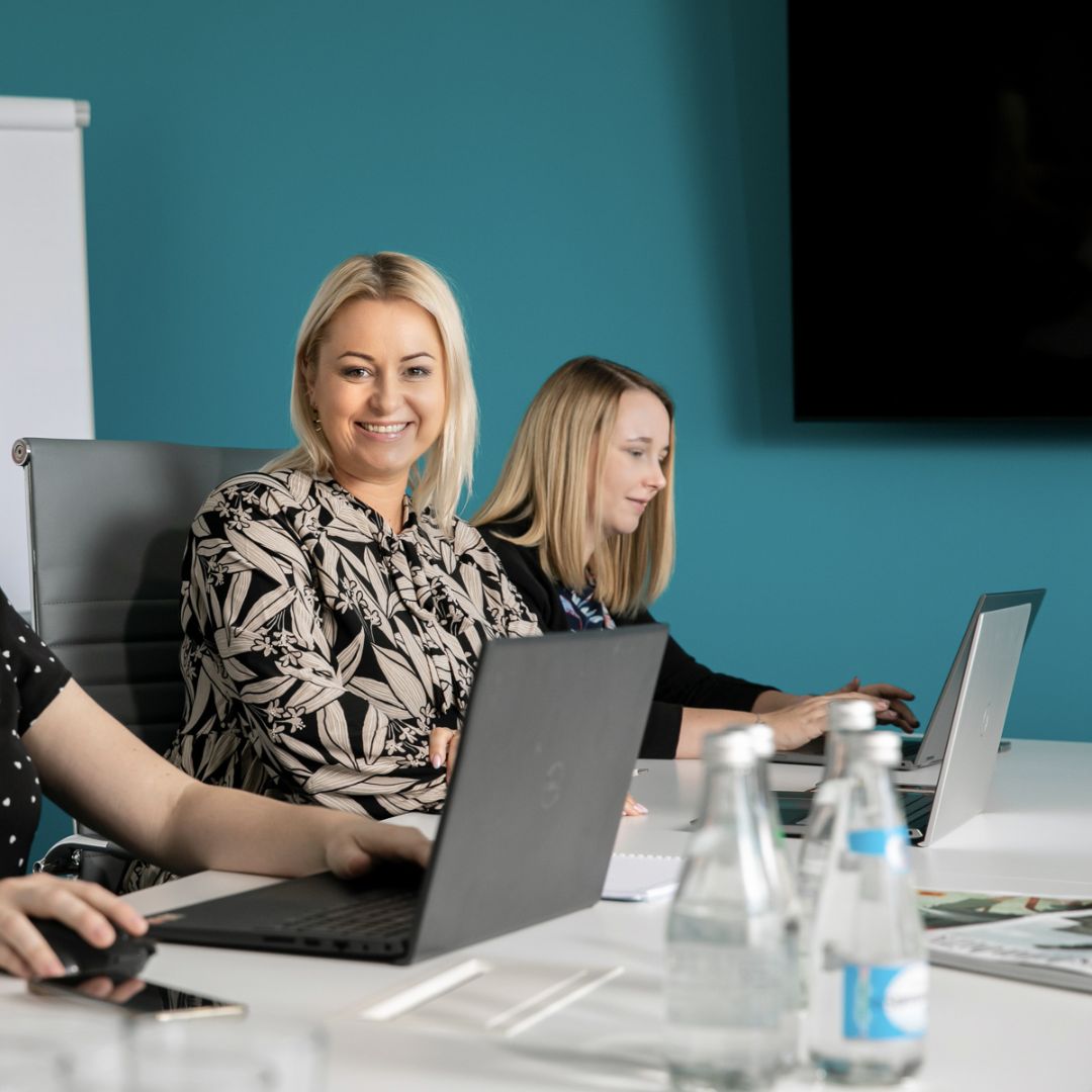 Team of Women Working Collaboratively in Modern Office