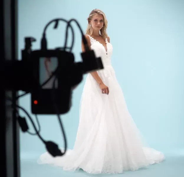 Bride Modeling Wedding Dress in Photography Studio
