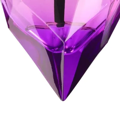 Detail shot of the base of a perfume bottle