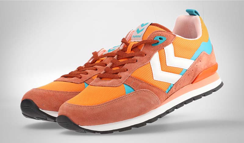 Orange shoes with a non-uniform background due to vignetting