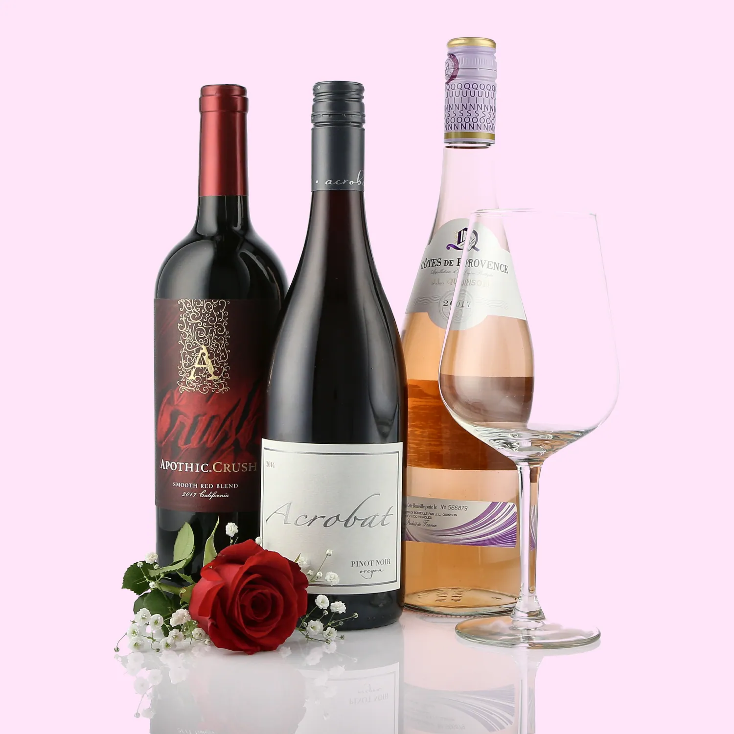 Wine product image with a wine glass and rose on a pink background