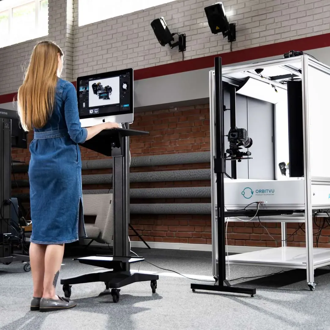 Woman using Orbitvu studio and mobile workstation
