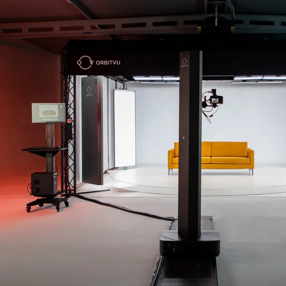 Orbitvu furniture photography studio setup with yellow sofa