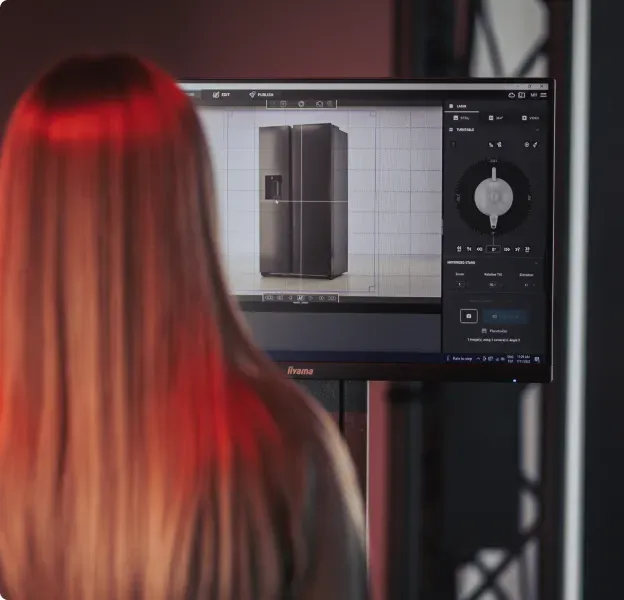 Woman photographing refrigerator product